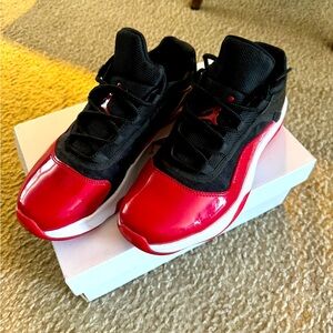 Women’s size 8 air Jordan 11 black/red/white